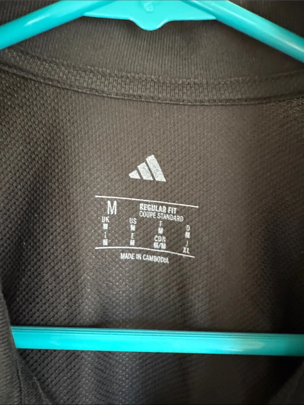 adidas Men's Black and White Quakes Polo Shirt